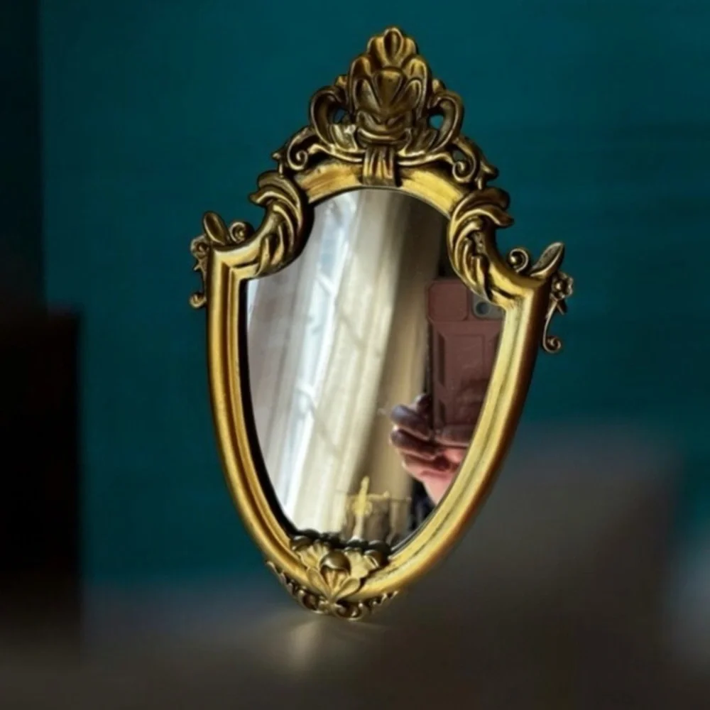 Ornate Gold and Black Decorative Mirror